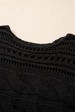 Short black sweater in Twisted Twisted mesh