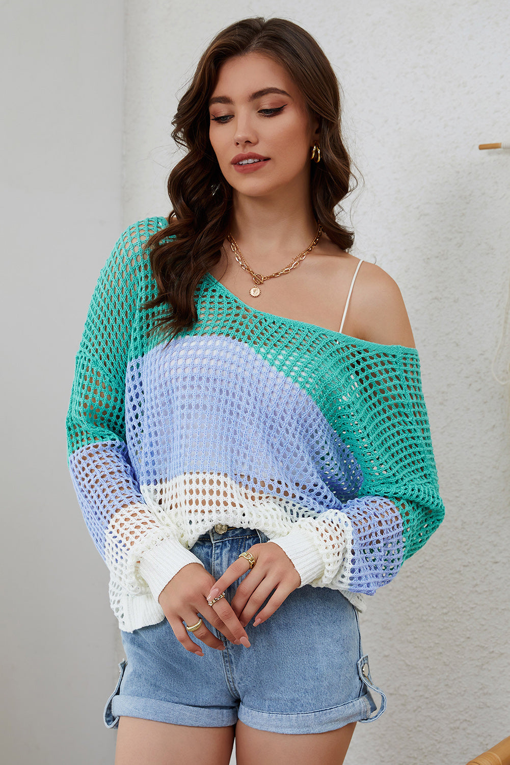 Top de tejer multicolor verde con mangas largas con ojales retorcidos y espalda