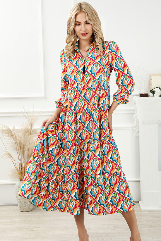 High waisted dress with long sleeves and multi-colored abstract geometric print