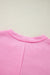 Amplia sudadera con boutheter rosa unido