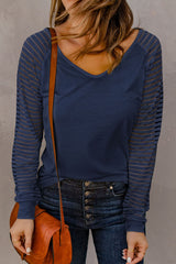Blue V-neck top with sheer stripes
