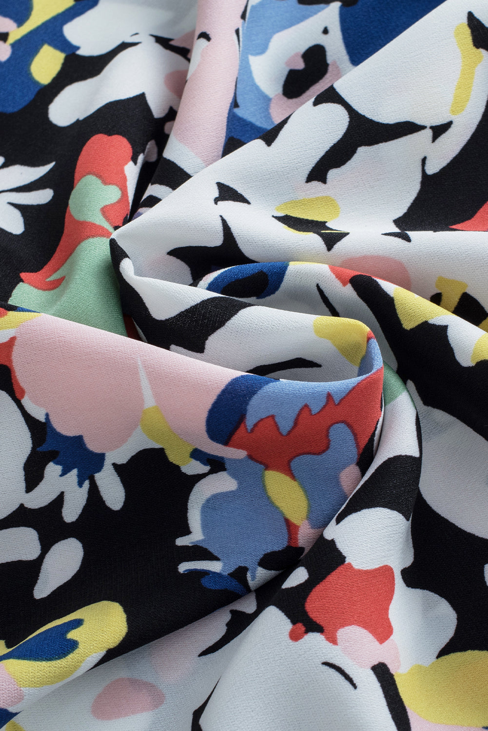 Blouse noire à volants et manches flottantes à fleurs nouée à col en V-A WOMAN WE LOVE