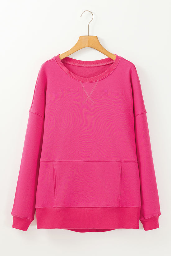 Ample sweatshirt with pockets and crossed seams *