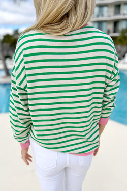 Bright green striped long sleeve top with contrasting edges