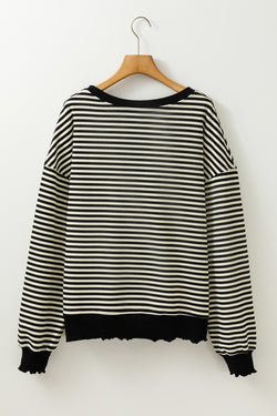 Long sleeve top and drooping shoulders with black stripes