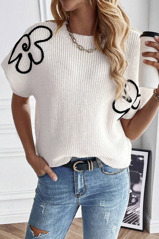 Top de pull à broderies à fleurs blanches