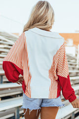 Sweat-shirt surdimensionné à col en V et à rayures blanches