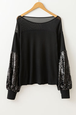 Black blouse with lantern sleeves and sequins patchwork