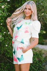Ensemble haut et short à manches bouffantes et papillon à paillettes colorées blanches-A WOMAN WE LOVE