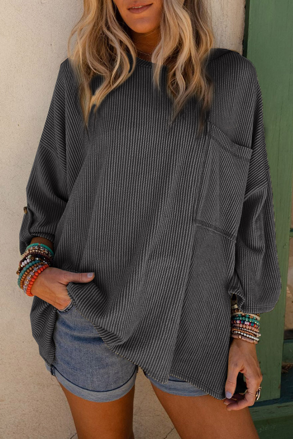 Dark grey ribbed oversized top with rolled up sleeves and chest pocket