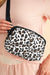 White multi-layer zipped shoulder bag with cheetah print