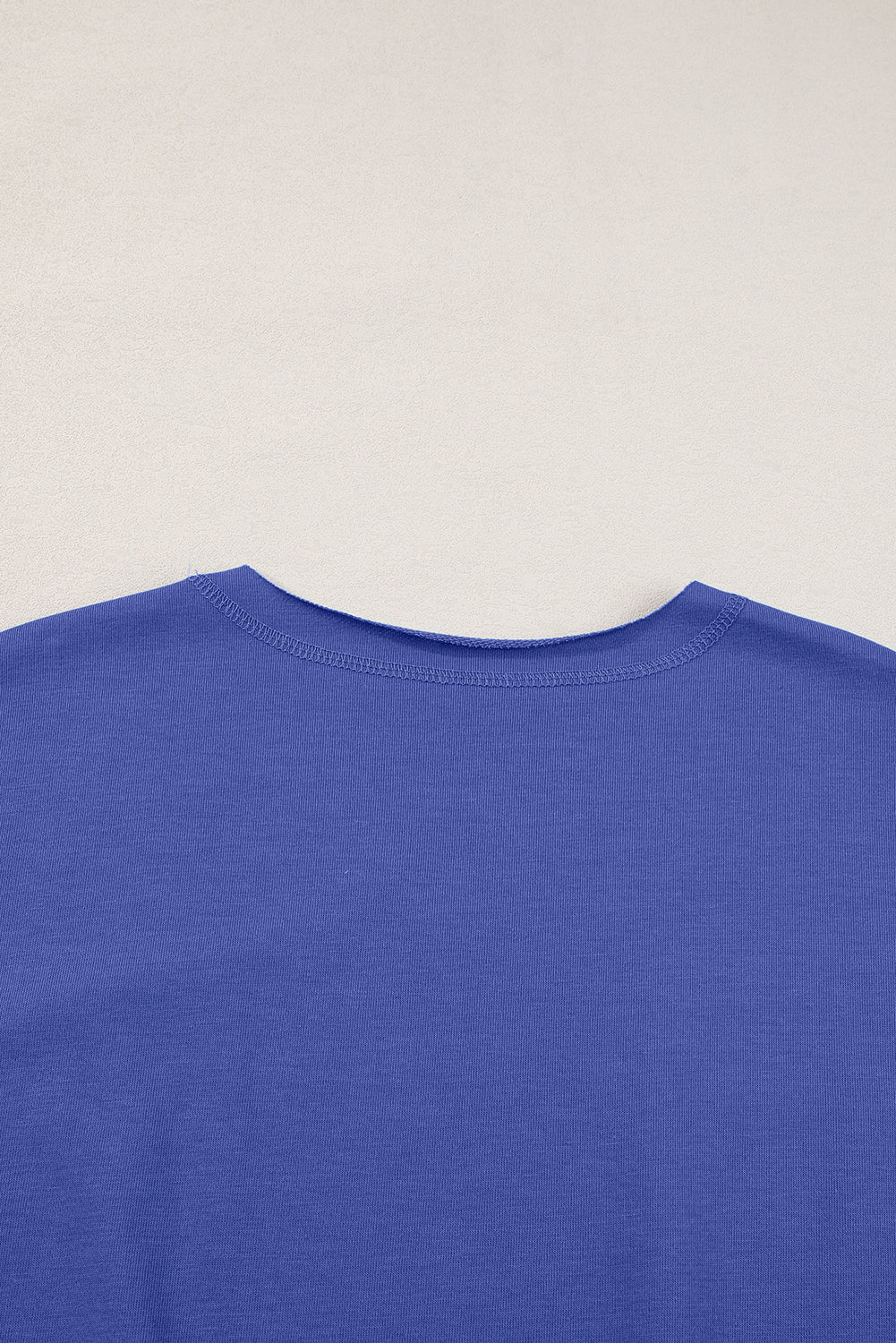 Dark blue loose t-shirt with lettering USA and notched collar