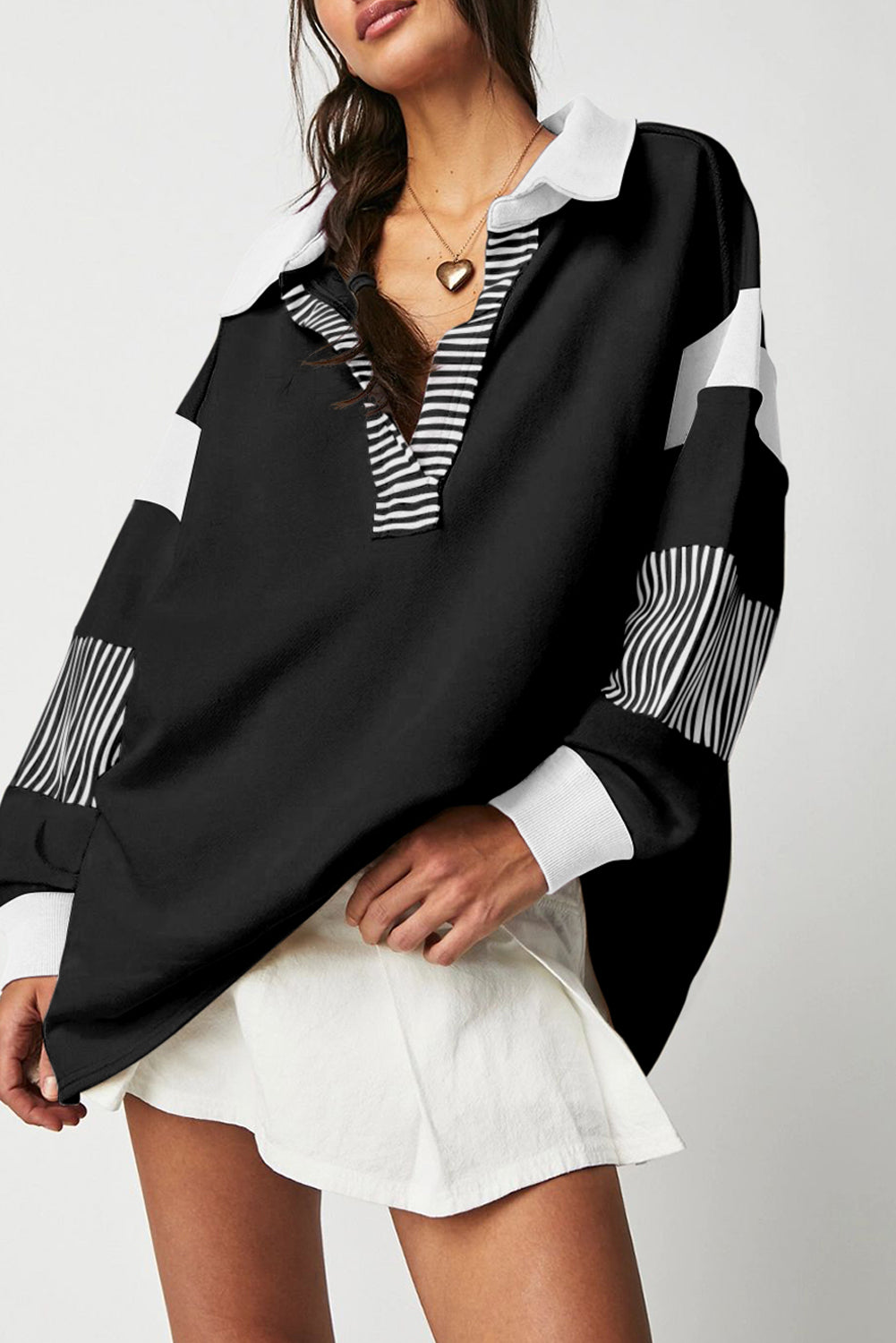 Sweat-shirt noir à rayures color block *