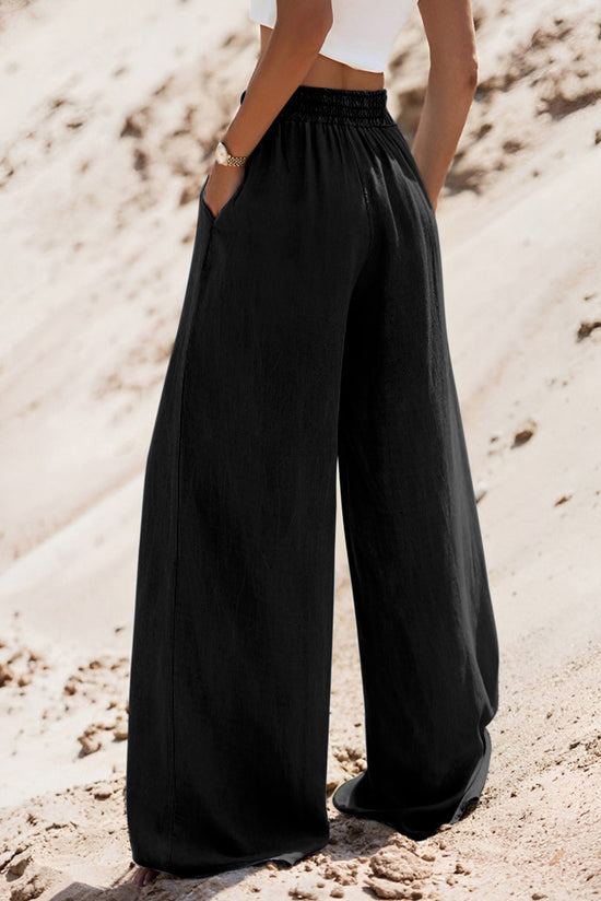 Pantalon en Jean noir à taille haute *