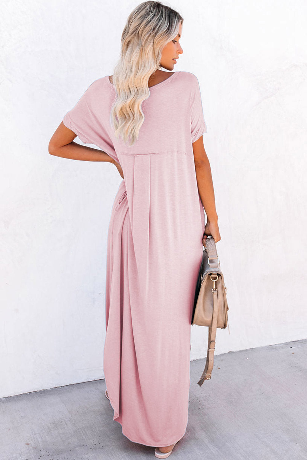 Long pink t-shirt dress with hidden pockets and v-neck