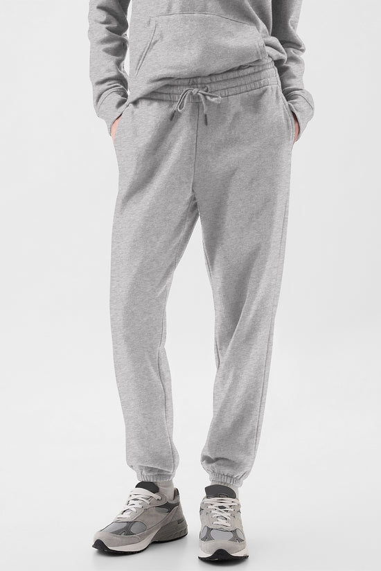 Pantalon de jogging gris clair à la taille avec cordon de serrage et doublure en polaire de couleur unie