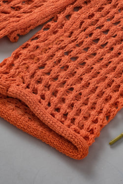 Orange tunic with handle knitting sleeves open to crochet