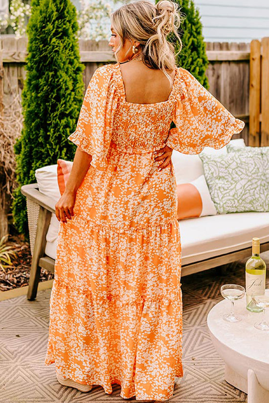 Robe longue smockée à imprimé floral orange*