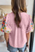 Pink blouse with embroidered flowers and puffy sleeves, split collar