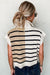 Black sweater vest with color block stripes and zipped collar