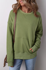 Ample sweatshirt with pockets and crossed seams *