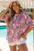 3/4 -leveled frowned tunic blouse and multicolored floral print