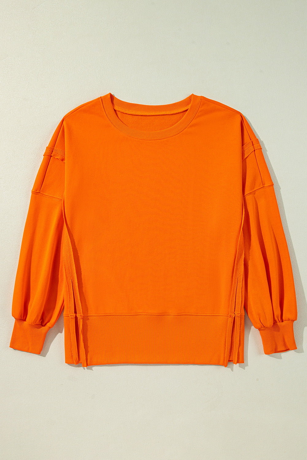 Carrot Exposed Seam Drop Shoulder Round Neck Sweatshirt with Slits