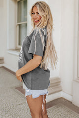 Camiseta gris de gran tamaño con estampado gráfico y letra con eslogan de guitarra