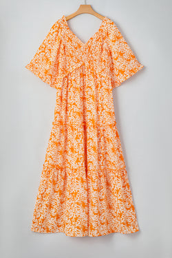 Robe longue smockée à imprimé floral orange*