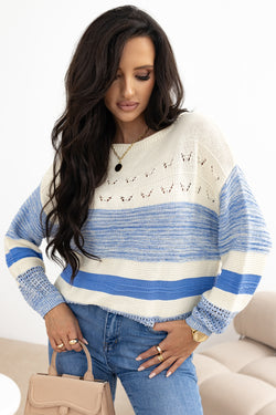 Light blue sweater with puffed sleeves and open stitch