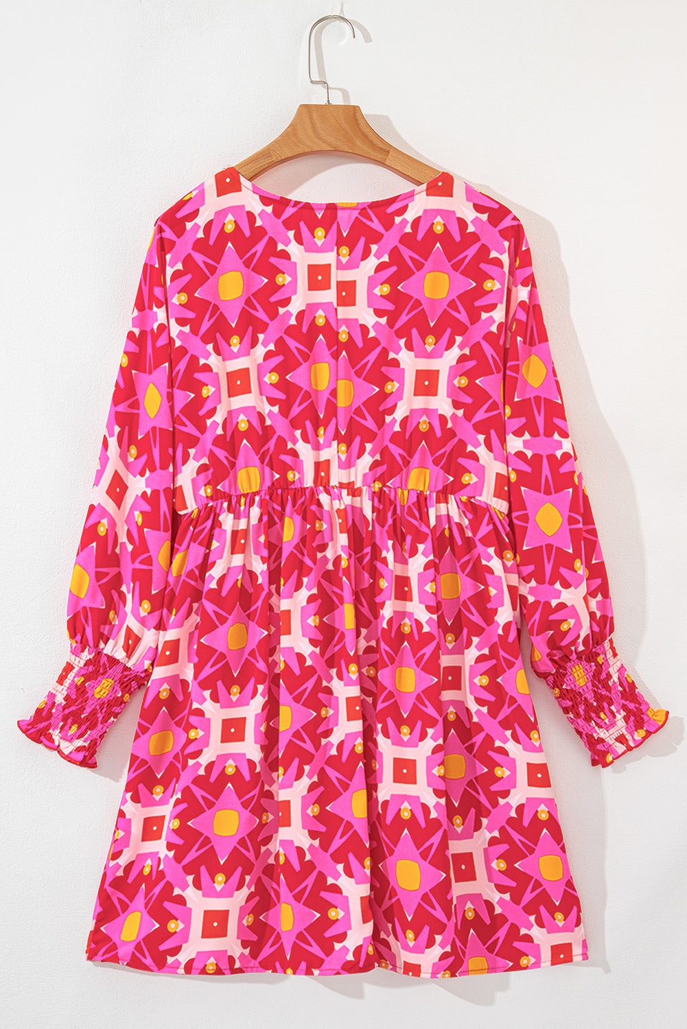 MINI-ROBE SMOCKED WITH LONG SALKS AND PLOS MEADERTICAL PROCESS