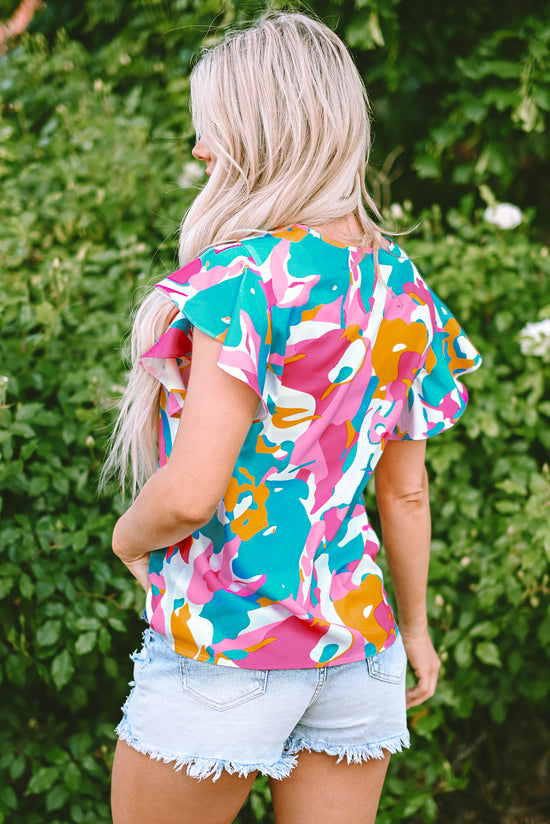 Multicolored blouse with abstract print and notched collar with floating sleeves