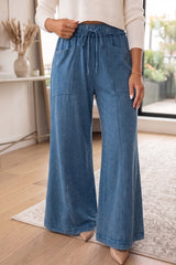 Pantalon évasé en coton délavé à cordon et coutures apparentes