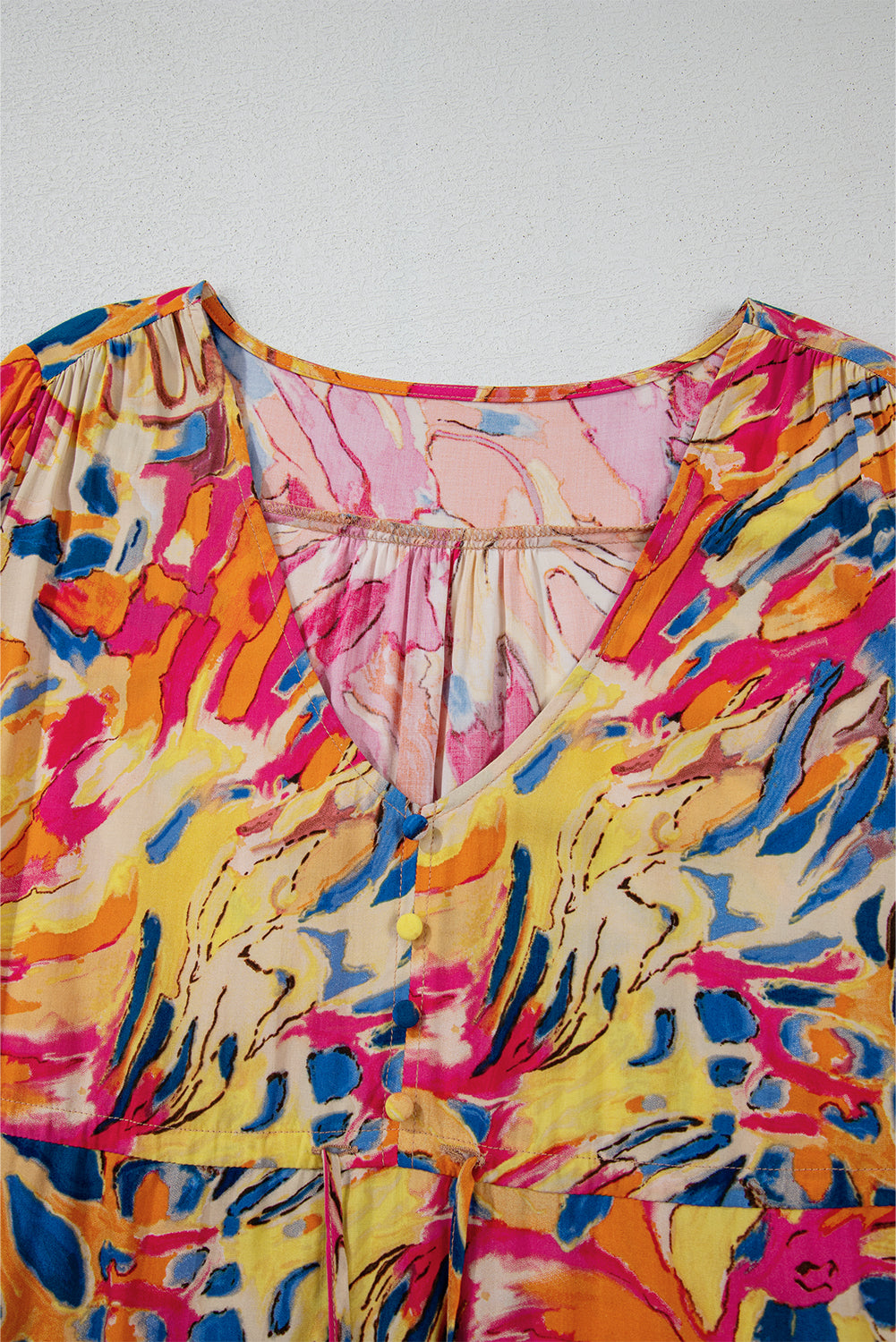 Robe fluide rose à manches évasées *