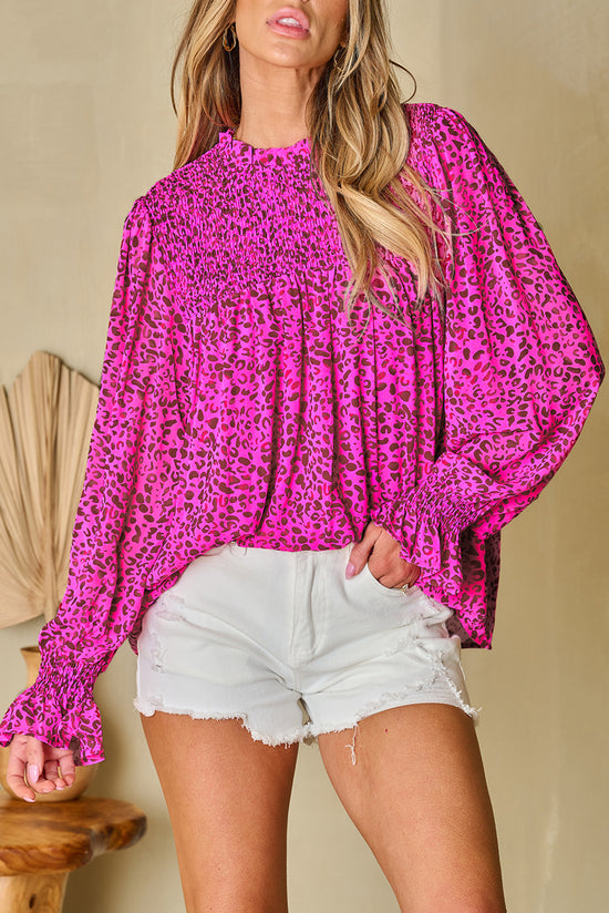 Fluid blouse gathered with puffy sleeves and pink leopard