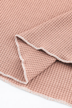 Long -sleeved textured high and apricot pink round pink neck *