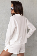 Ensemble sweat-shirt zippé côtelé blanc et short taille haute-A WOMAN WE LOVE