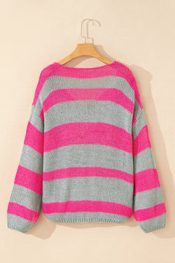 Loose fit color block knit sweater with pink stripes and v-neck