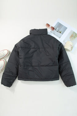 Black zipped down jackets with drawstring hem