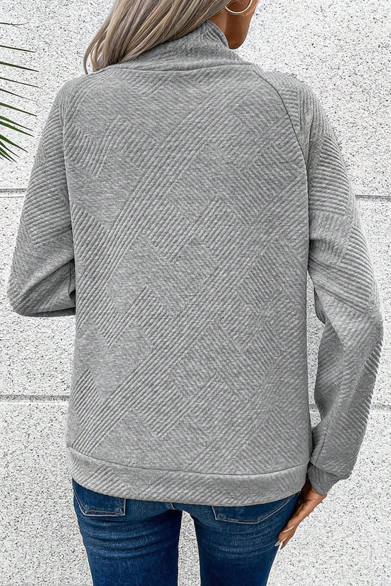 Grey textured sweatshirt with mock neck and asymmetrical buttons