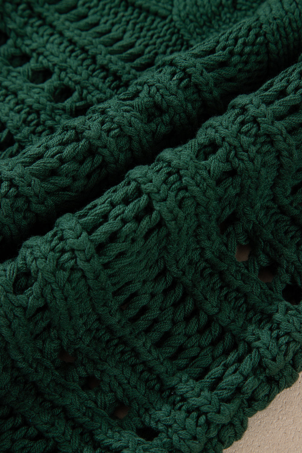 Pull court en tricot torsadé ajouré vert noirâtre