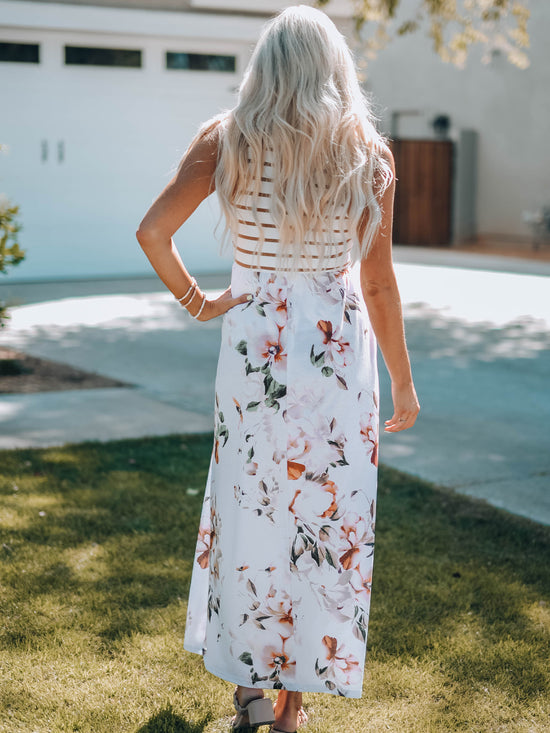 Long white dress without sleeve with floral print and stripes with pocket