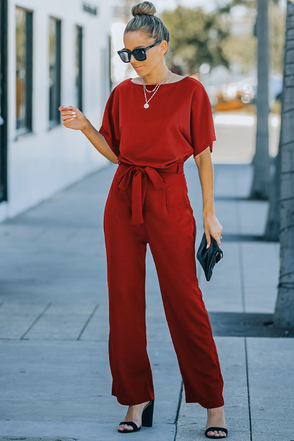 Bright red belted wide leg jumpsuit