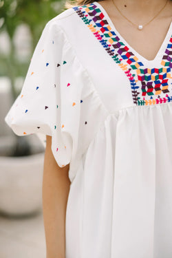 White blouse embroidered with puffy sleeves and v -collar