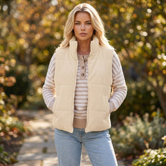 Gilet matelassé beige en velours côtelé à col montant, zippé