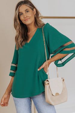 Green loose blouse with flared sleeve and v -collar