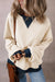 White oversized sweatshirt with dropped shoulders and color block patch