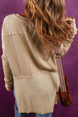 Light French beige waffle knit patchwork top with exposed seams and split collar