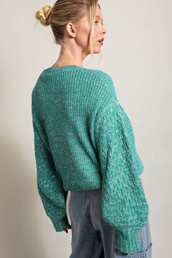 Water green sweater with drooping sleeve in twisted knitting