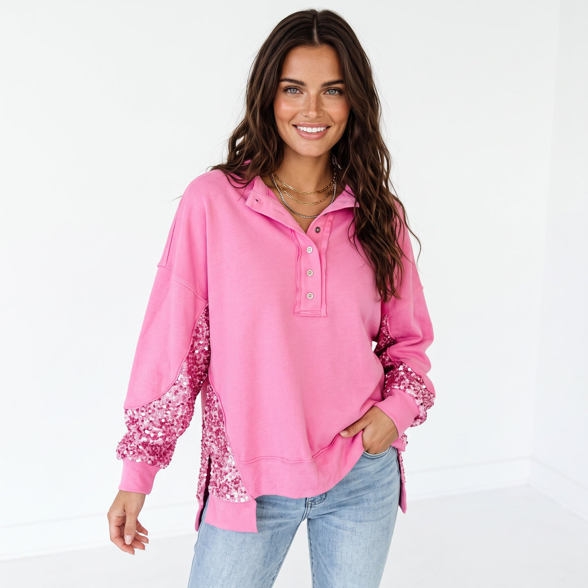Henley sweatshirt with high and low hem in patchwork of candy sequins